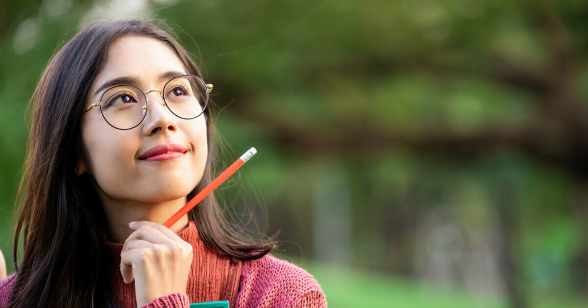 A young woman contemplating about financial planning and emergency fund