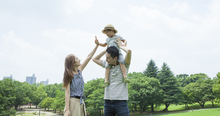 A family being happy together because they are protected with cancer insurance