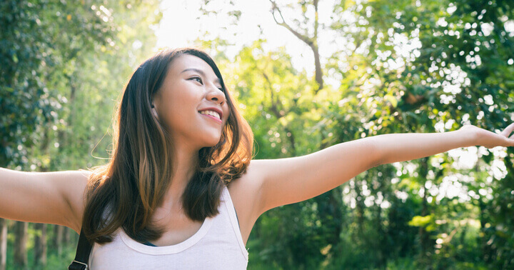 Girl feeling happy in nature 