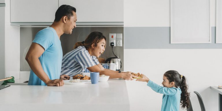 A happy family protected with ePROTECT maid insurance