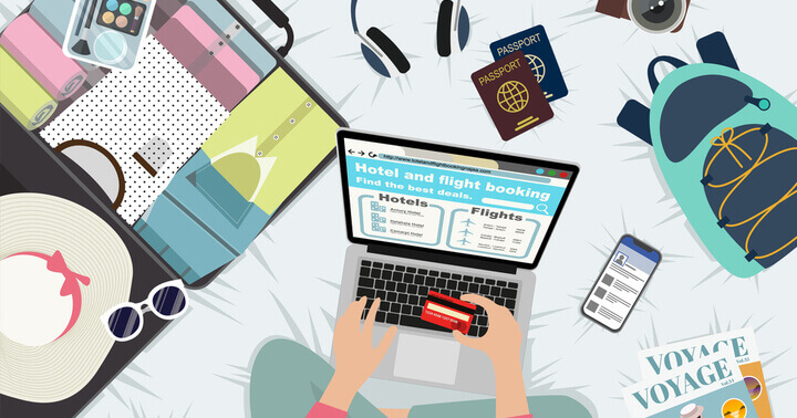 Making travel arrangement online with open luggage