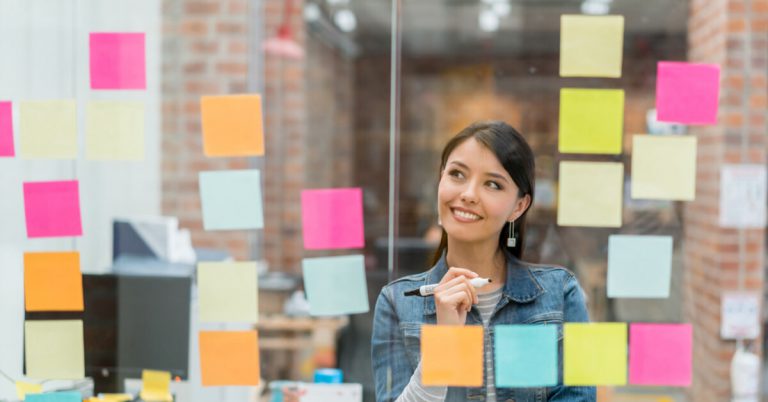 A woman figuring out which of the 3 types of life insurance is the best one for her