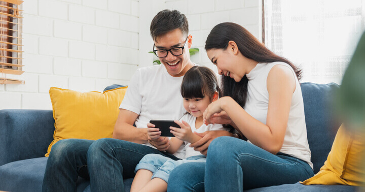 A family enjoying time together during the Circuit Breaker