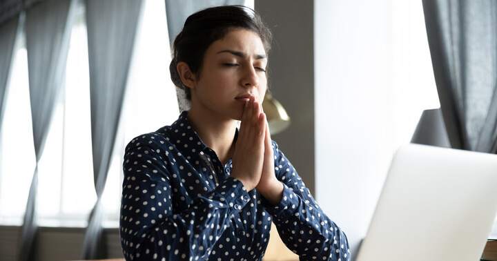 A young professional woman hoping for the best
