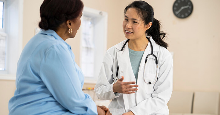 Doctor explaining to patient in a medical consultation