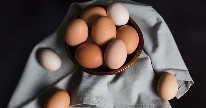 eggs in a bowl and on napkin