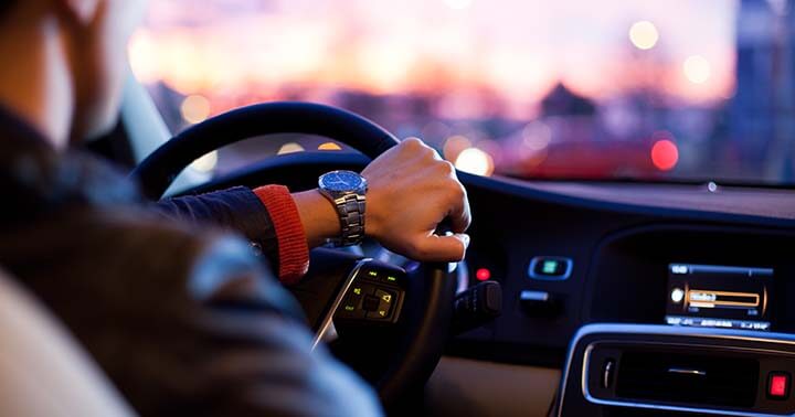 A man driving at night