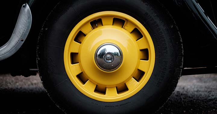A yellow car wheel