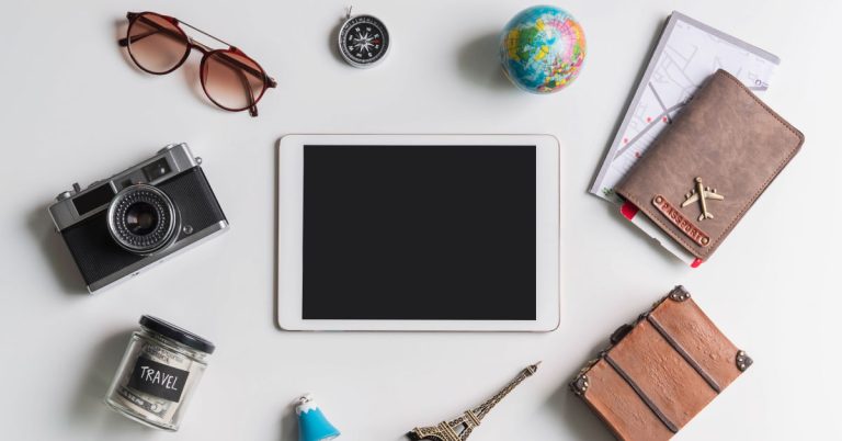 tablet-with-travel-essentials-accessories-and-items