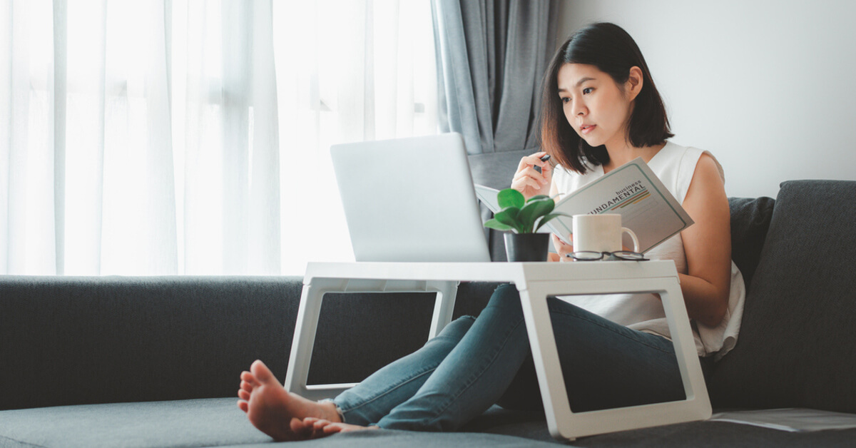 A lady looking into her laptop