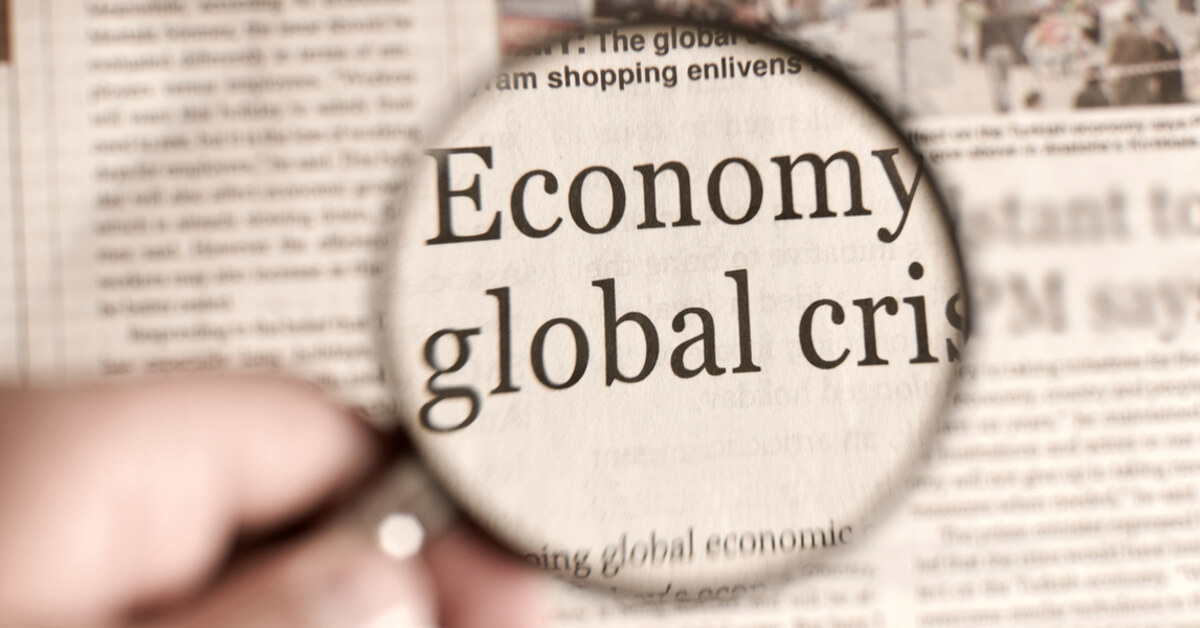 Surviving Recession: a newspaper cutting showing an economy and global crisis