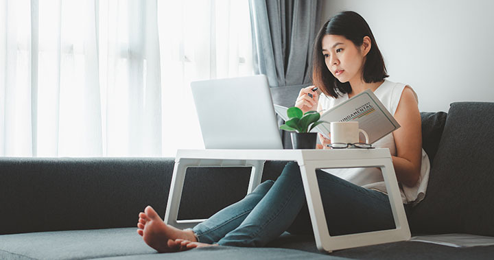 Young employee working from home office