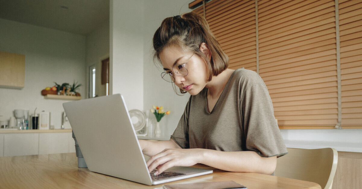 Image of a stressed lady working from home