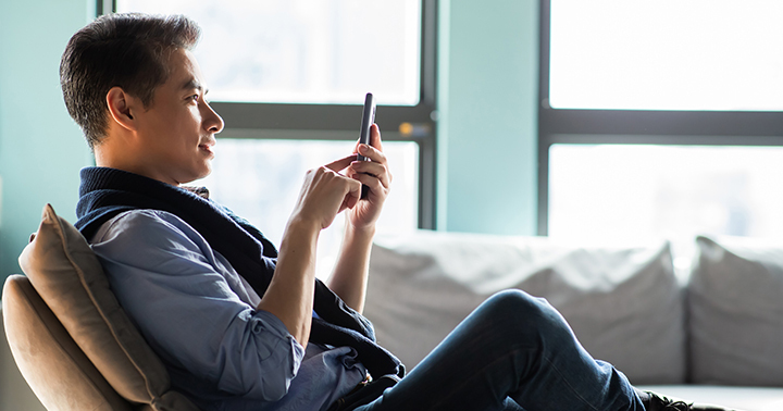 Asian man using smartphone