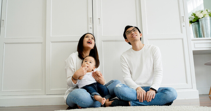 A family pondering on whether they should switch home insurance