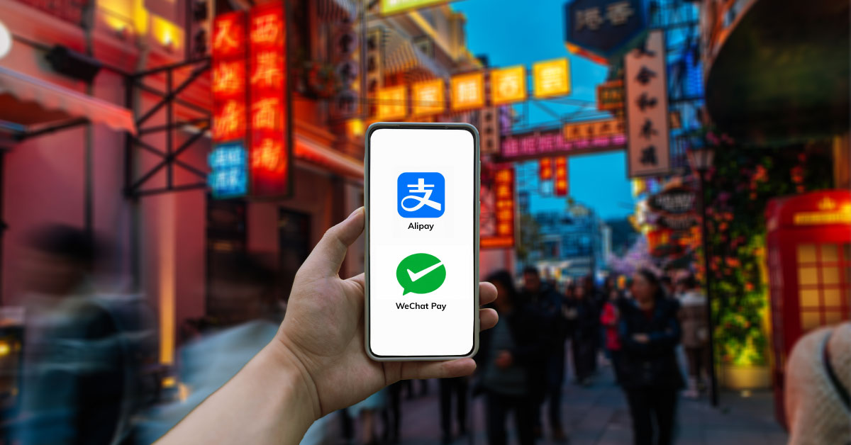 smartphone-in-front-of-a-modern-urban-shopping-mall-in-china-alipay-wechat-pay
